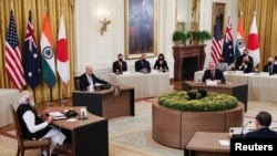 9月23日，拜登总统在白宫与来访的印度、澳大利亚和日本领导人举行面对面的会谈。