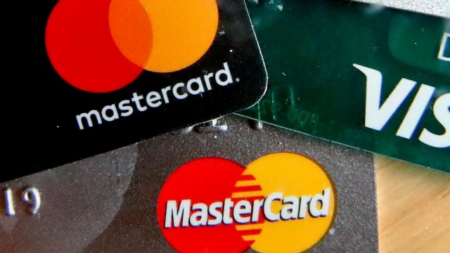 Mastercard and Visa credit cards in Zelienople, Pa., on Feb. 20, 2019. (Keith Srakocic / AP) 