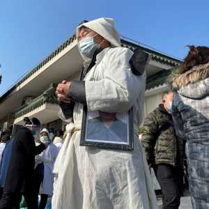 世卫:上周全球新冠死亡人数达四万 中国占逾半