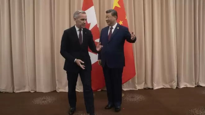 卡尼访华之际：北京敦促加拿大别再"跟着美国走"!