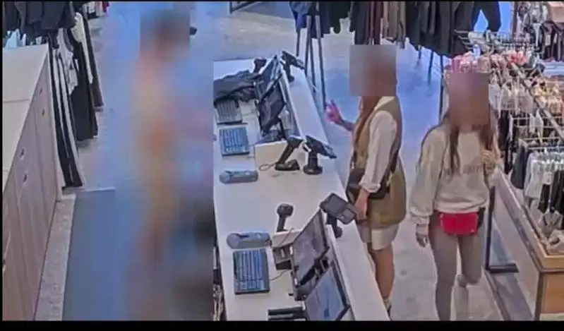 长发飘飘华女盗他人卡 尔湾名店狂消费 结果...