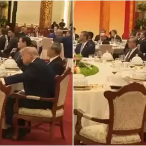 特朗普趁习近平离席“偷看笔记”  网民热议戏称“间谍行动”