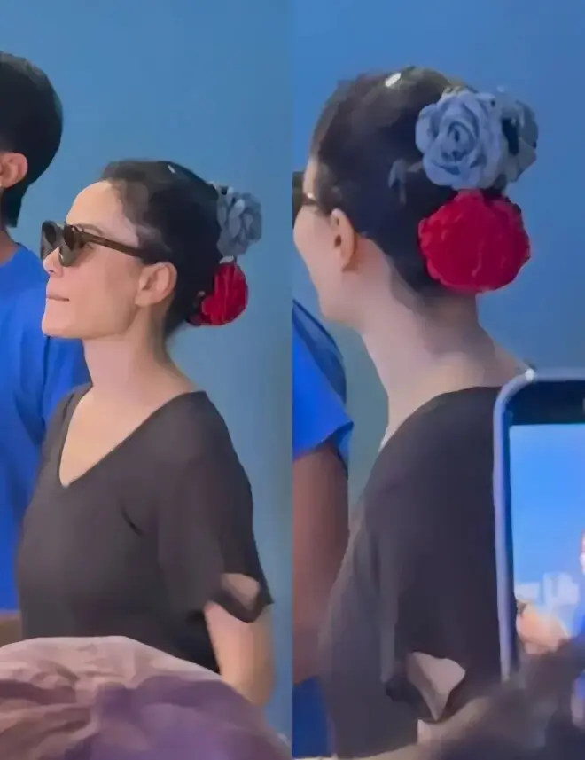 头戴两朵玫瑰花，王菲这么穿着去看窦靖童演出，被赞“松弛天花板”